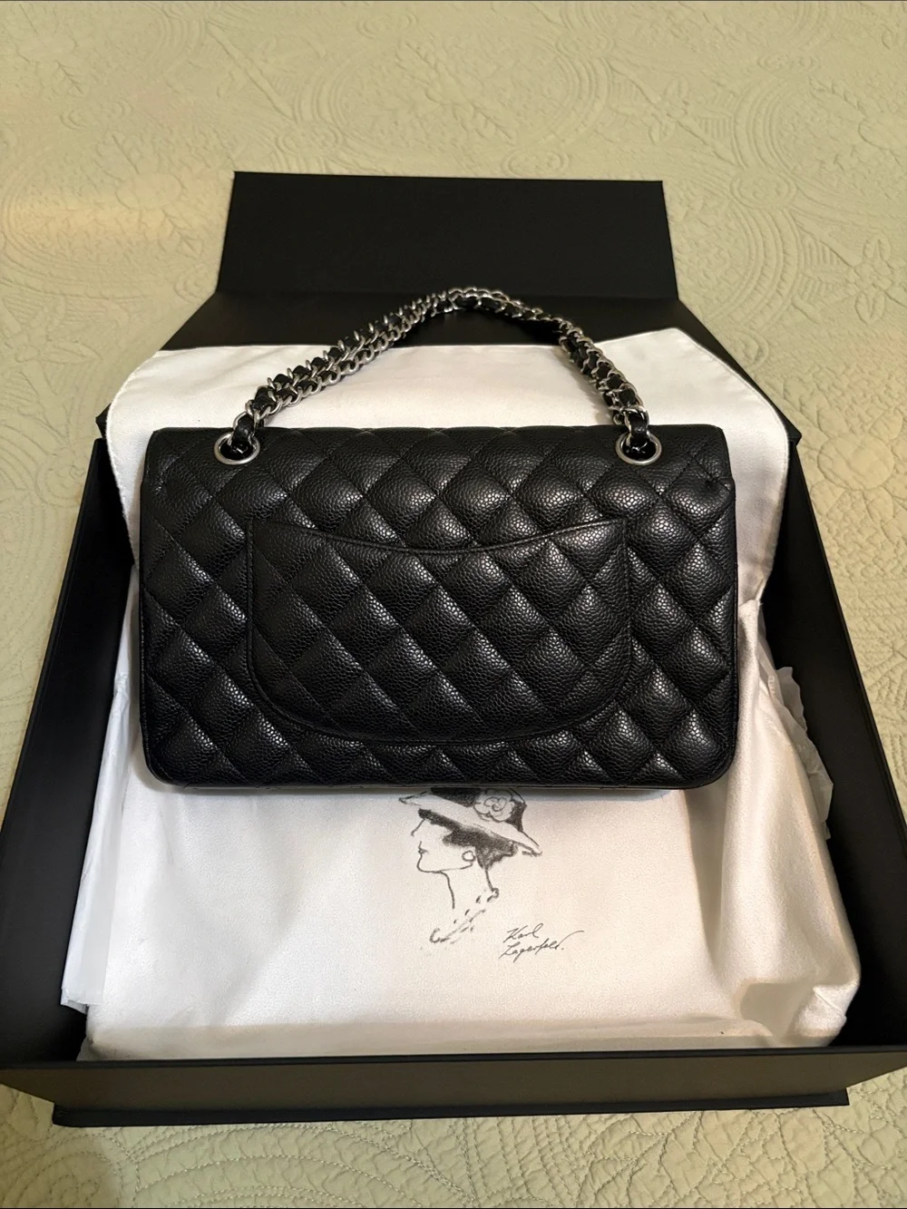 CHANEL Black Quilted Flap Shoulder Bag with Silver Hardware